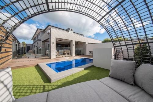 Casa de Praia - Luxe by the Bay with Heated Pool