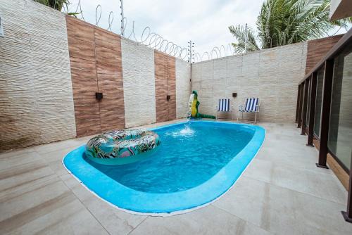 Casa em Jacuma, com piscina, 5 suites e fliperama