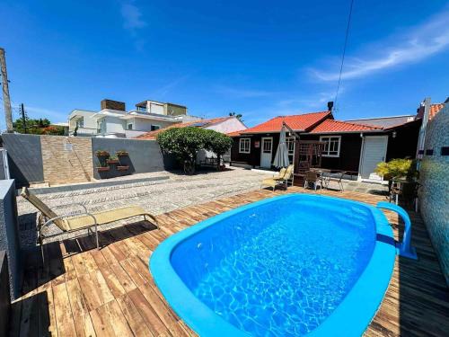 CASA FOCA 271 - casa aconchegante com piscina, churrasqueira, mesa de sinuca e pebolim