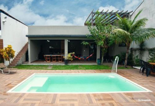 Casa pet friendly c piscina churrasqueira e wi-fi