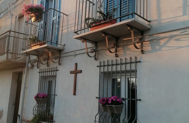 "Casa Vacanze Bau Mela" con vista a la montaña y jardín compartido