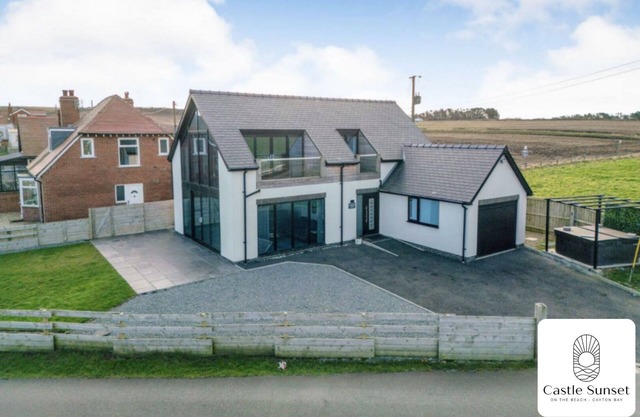 Castle View: Beachfront Luxury Home with Hot Tub, Ocean Views & Family Amenities