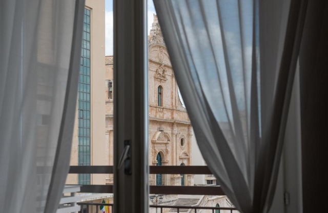 Central House palazzo Brafa una camera di albergo