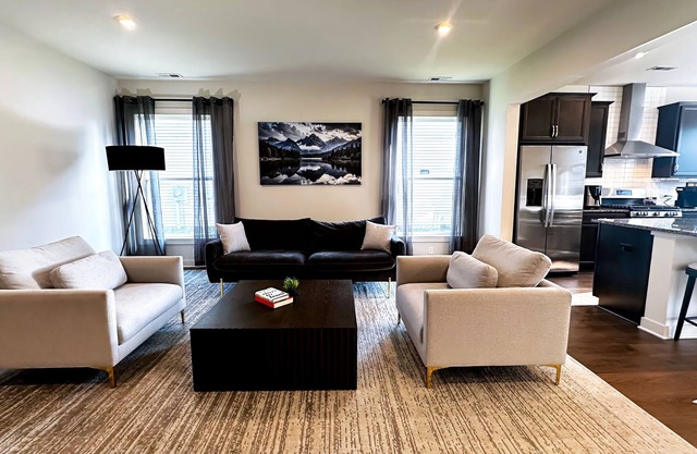 Luxury 4BR Retreat & King Beds + 77” TVs + Workspace Near Golf & Downtown