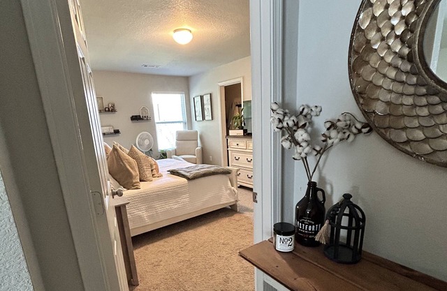Centralized home in new neighborhood w/ fenced in yard, covered patio, & more!