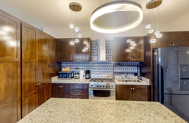 Centrally located apartment with pool table, balcony, W/D, & on-site pool