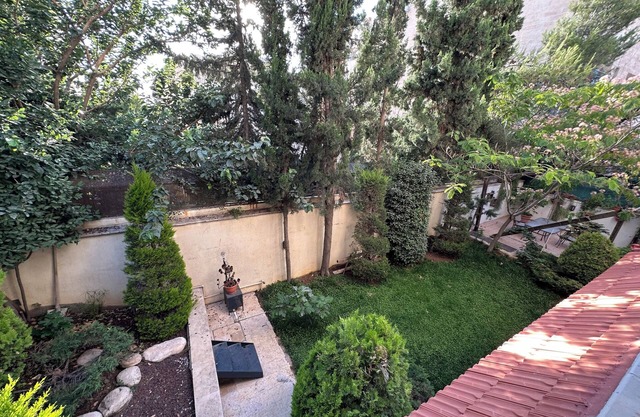 Centrally Located Bright 2 BR Apartment with Breathtaking Tropical Tree Garden!