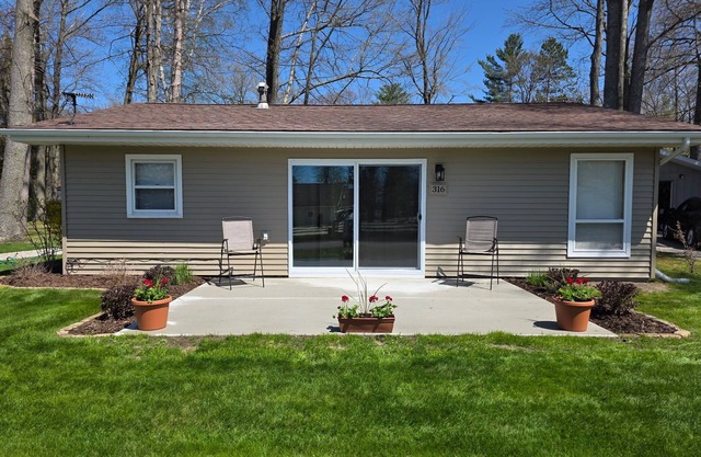 Centrally located, four season retreat w/firepit and lakeview.