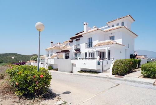 Chalet familiar con hermosas vistas al mar en Manilva