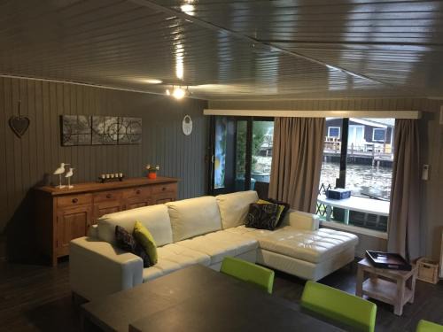 Chalet in park with a fishing pond