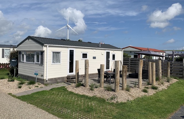Chalet Lynn en la playa y el mar (Oosterschelde)