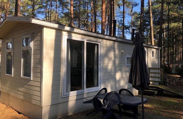 Bonito chalet con jardín, en un parque de vacaciones en medio de Amberes Kempen