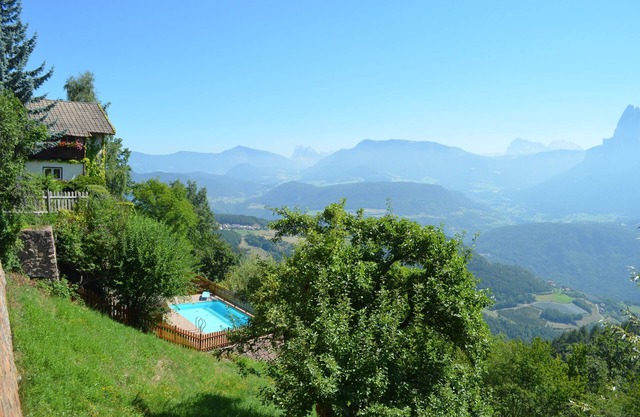 Chalet with pool and garden overlooking the Dolomites