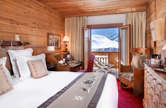 Chambre confort + balcon, accès spa, ski aux pieds