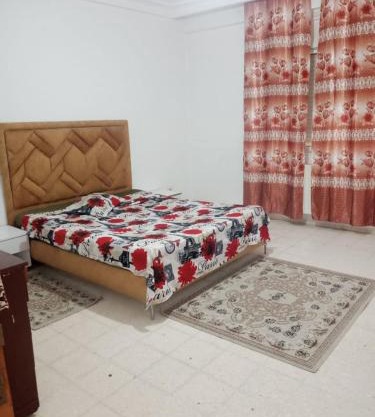 Charmant Appartement 2 chambres avec Internet et Vue Panoramique - au Cœur du Quartier Prestigieux d'Ennasr 2, Proche de Toutes Commodités - Service Navette