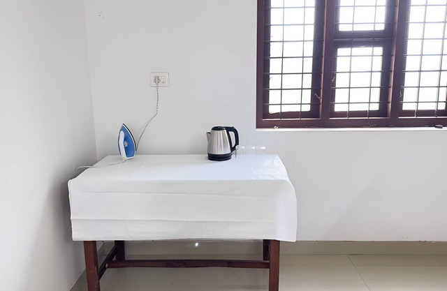 Charming 1-bedroom house in Koyilandy with WiFi access