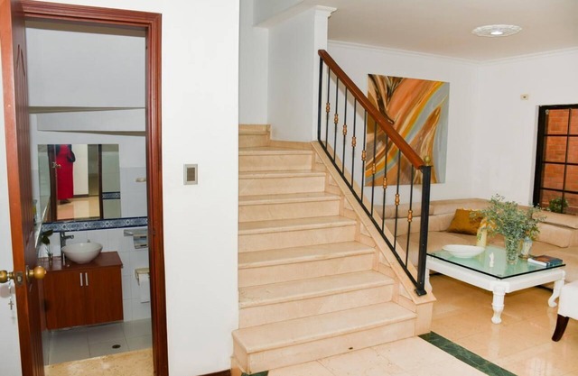 Charming 1-bedroom house with AC, TV, bathroom, WiFi, pool, parking, camara