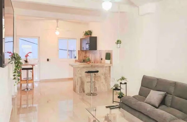 Charming 1-bedroom Apartment in with Small Gated Garage-5 min drive to the Beach