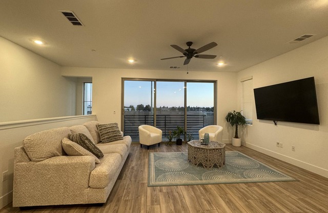 Charming 2-bedroom townhome with garage, pool access, & all utilities included.