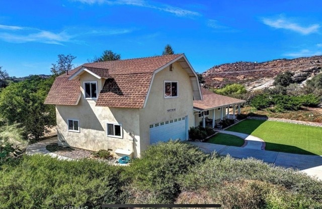 Charming 2 homes on 2.5 acres, 5 bedroom, 3 full bath horse property