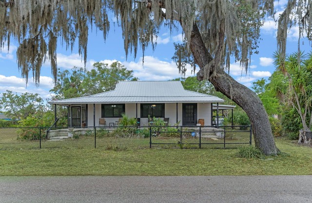 Charming 3-bdrm house. Spacious yard, plenty of parking, & a peaceful setting.