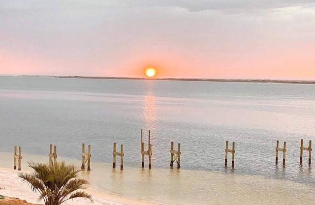 Charming 3-bedroom 1st floor condo on private beachfront in delightful Pensacola