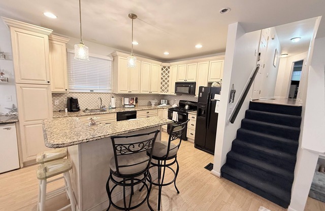 Charming 3-bedroom 2 bath , 1st floor condo on 23rd & Asbury