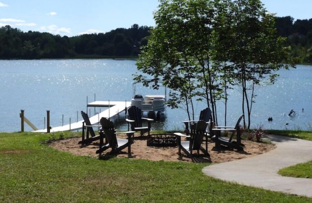 Charming 3-bedroom home on the Cheboygan River w/ Boat Dock and Kayaks