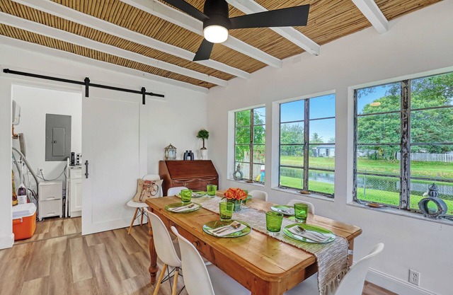 Charming 3BR Canal Home w/patio dining, Fire Pit & Workspace