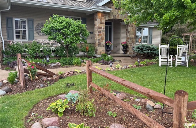 Charming 4-bdr chateau in Neenah. Includes 75 ft RV pad with power & water h/u's