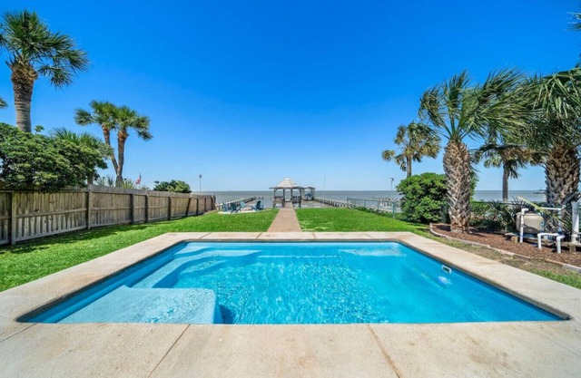 Charming Bayfront Home w/ Pool, Pier, and Firepit