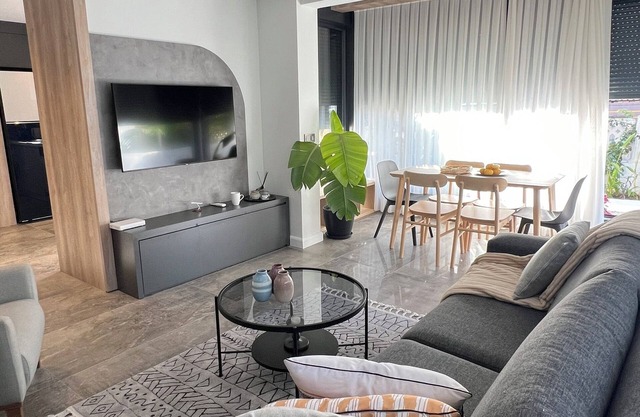 Charming Beachside Apartment with Private Garden