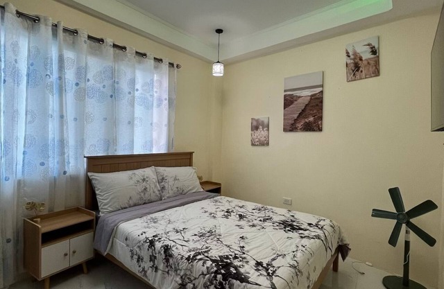 Charming Bed & Breakfast Room #1 with WiFi and AC in Delightful Compostela Cebu