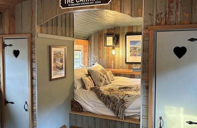 Charming Boutique Train Carriage with large outside seating area and bath