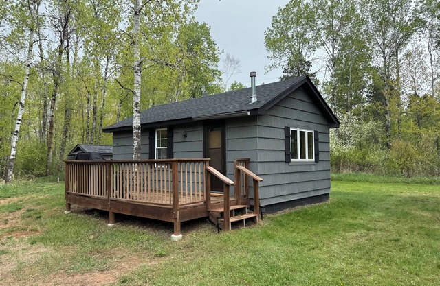Charming cabin in delightful Kerrick with AC near miles of ATV trails