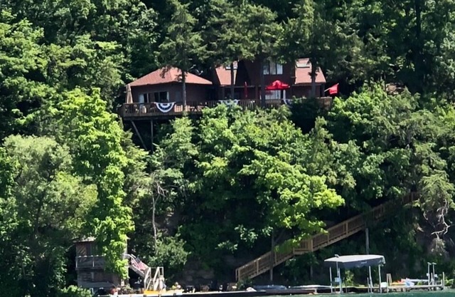 Charming cottage surrounded by nature. 368’ lake frontage and amazing views.