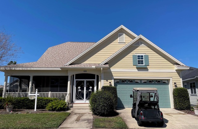 Charming cottage w/a wrap-around porch & golf cart—perfect for relaxation!