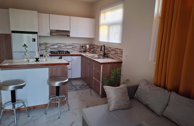 Charming cozy 1-bedroom apartment in fabulous Cottage St. George with WiFi, AC