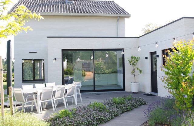 Charming family home, situated in a green setting with outside sauna.