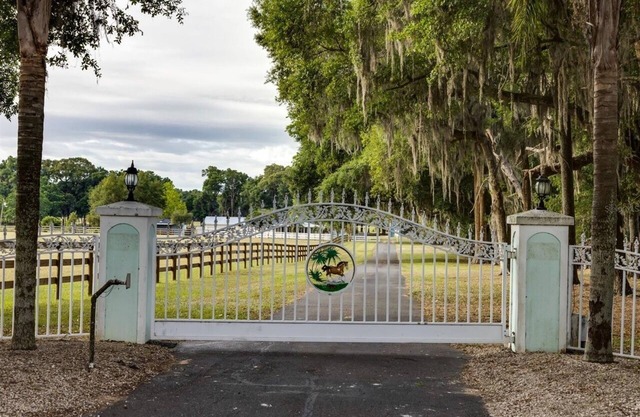 Charming farm with 2 homes, horse stables and heated pool ~ 5+ bedrooms near WEC