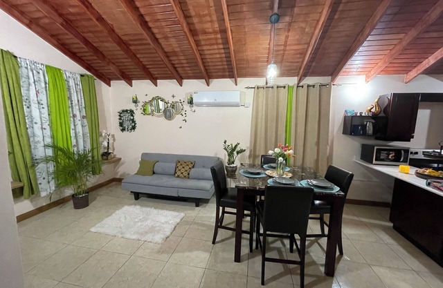 Charming gated 2-bedroom house with WiFi, AC, and spacious yard