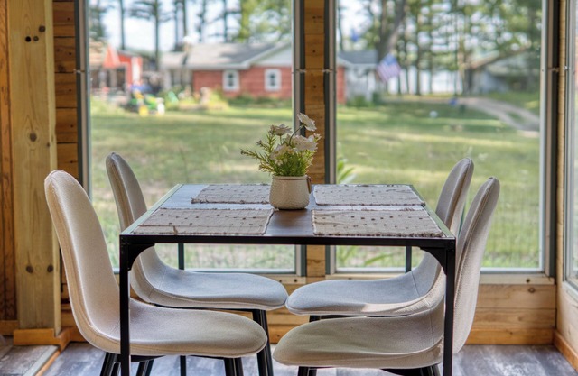 Charming Green Cabin with Private Round Lake Access, Minutes from Ludington