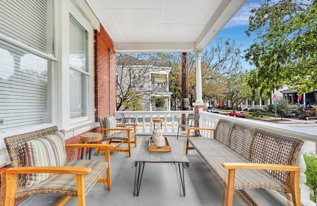 Charming Home w/ Cozy Porches, Courtyard, and Parking by Lucky Savannah