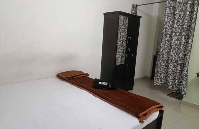 Charming lodge in serene Kochi with WiFi, AC