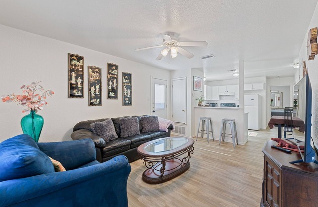 Cheerful 3-bedroom with fenced backyard.