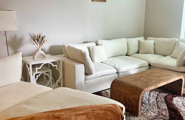 Chic 2-bedroom deluxe apartment with king beds, large Tvs, and a fitness center.