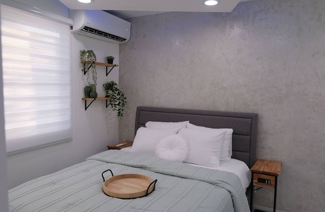 Chic apt , close to everything, 20% Archie jet ski rentals island verde beach