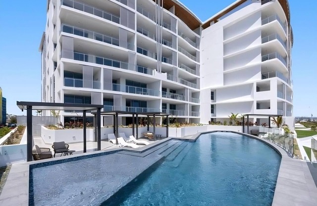 Chic Coastal Escape with Pool & Gym Access