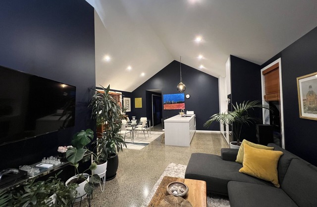 Chic, modern designer oasis on city fringe with large spa pool. Great kitchen!