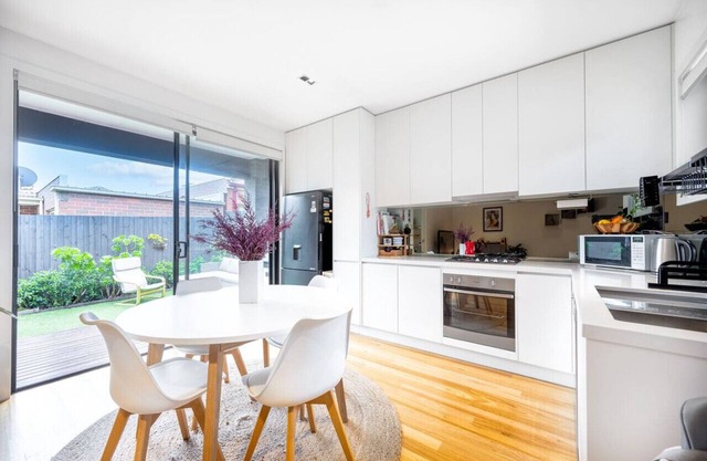 Chic modern home with private backyard and carpark